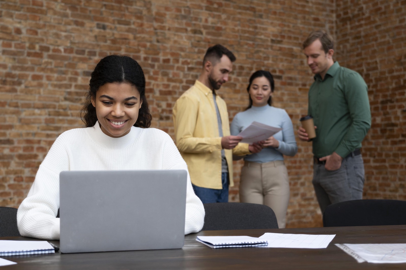 Professionals discussing a project-based staffing assignment